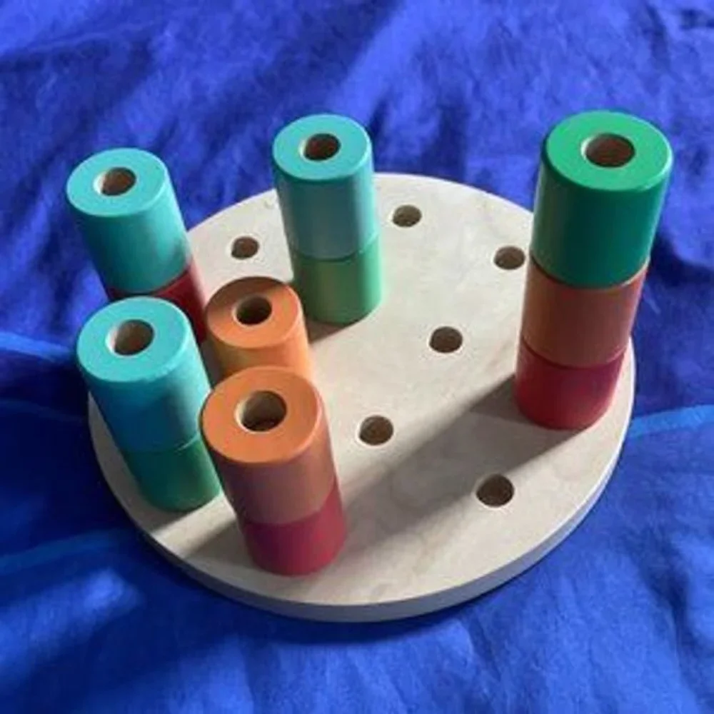Lovevery Wooden Stacking Pegboard, from The Adventurer Montessori Play Kit